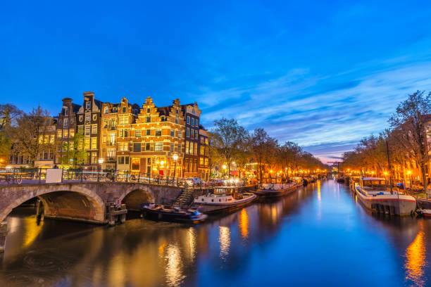 istock Amsterdam Netherlands, night city skyline at canal waterfront 1793197457