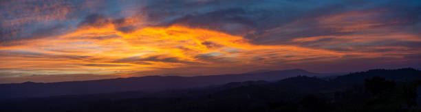 istock Beautiful  panorama golden hour with sky and warm-colored clouds 1793199976