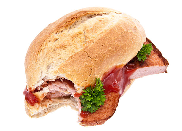 istock Bitten off meat loaf roll isolated on white 179320081