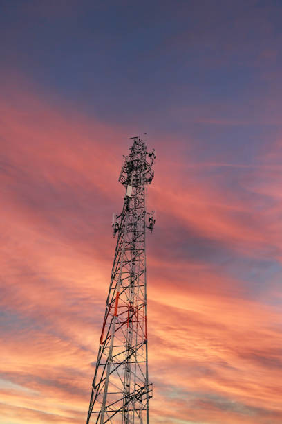 istock Telecommunication tower Antenna at sunset sky. vertical 1793217987