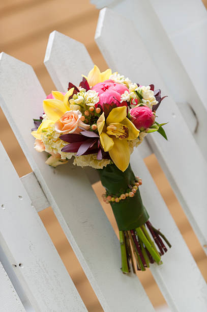 istock Bridal bouquet on a white fence. 179322377