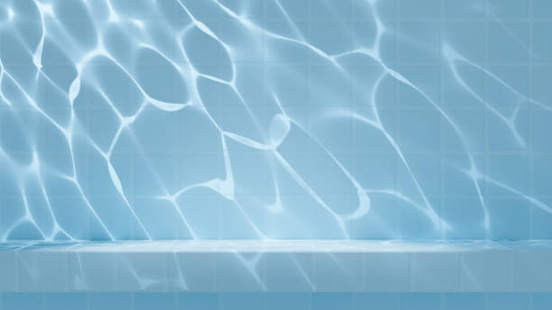 istock Light tiles space with a caustic effect from the water reflection on the wall and tiles pedestal for showcasing beauty products. 1793224995