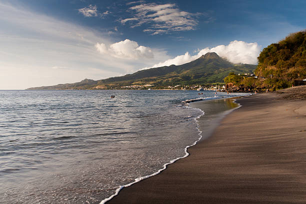 Black sand beach next to Saint Pierre, Martinique stock photo