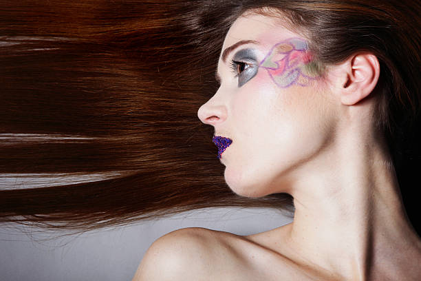 istock beautiful woman creative make up long hair 179323704