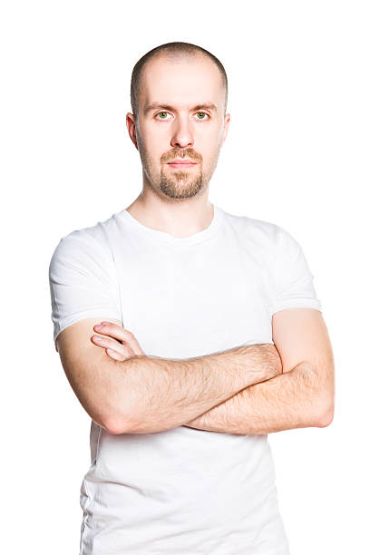 istock Handsome young man with folded arms in white t-shirt isolated 179323770