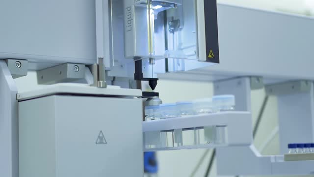 Closeup of working liquid spectroscopy machine at laboratory