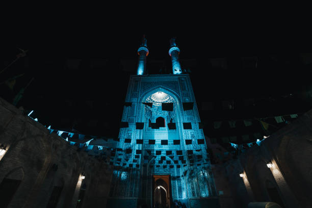 istock Blue lit Jameh Mosque by night with black flags, Yazd, Iran 1793249138