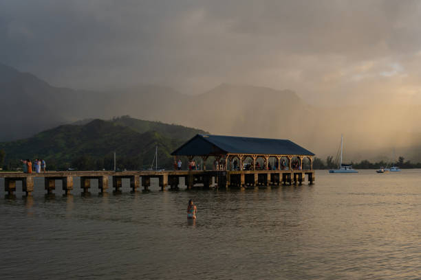 Hanalei, Kauai June 16, 2023 Sunset at Hanalei Bay with the pier on Kauai, Hawaii, United States.