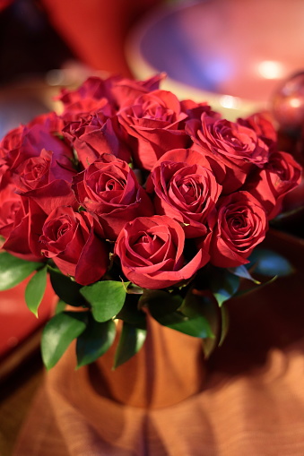 arrangement of red roses close up for party table decoration