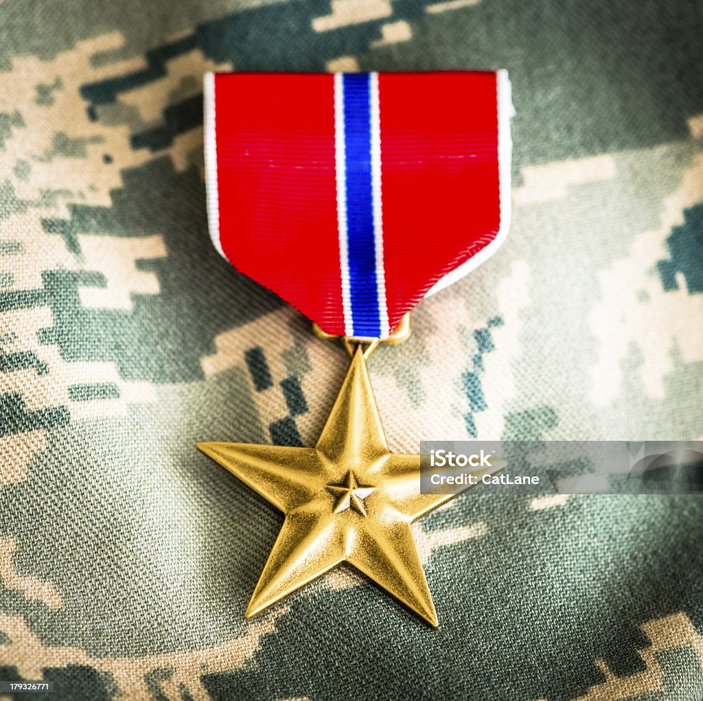 Médaille de Bronze militaire étoiles de Tenue de Camouflage - Photo de Forme étoilée libre de droits