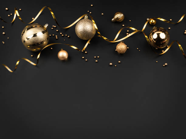 istock gold christmas balls black background 1793268560