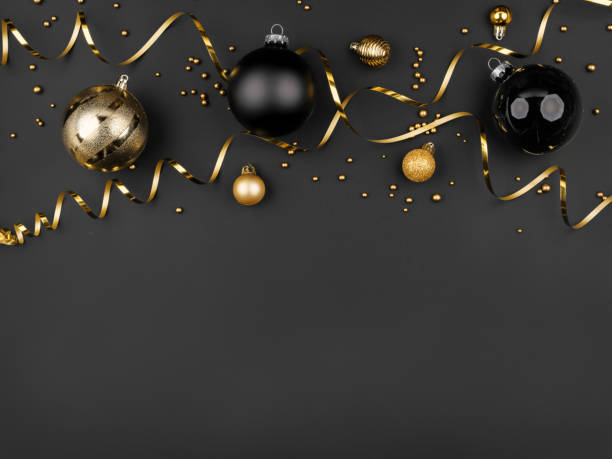 istock gold and black christmas balls black background 1793268568