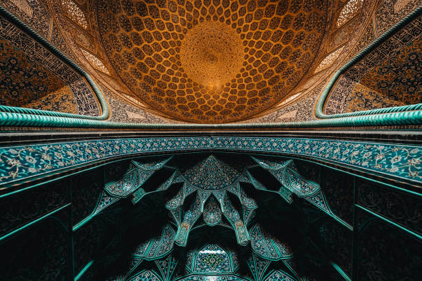 istock Huge archway and ceiling with artwork in the blue Shah Mosque at Naghsh-e Jahan Square, Isfahan, Iran 1793278897