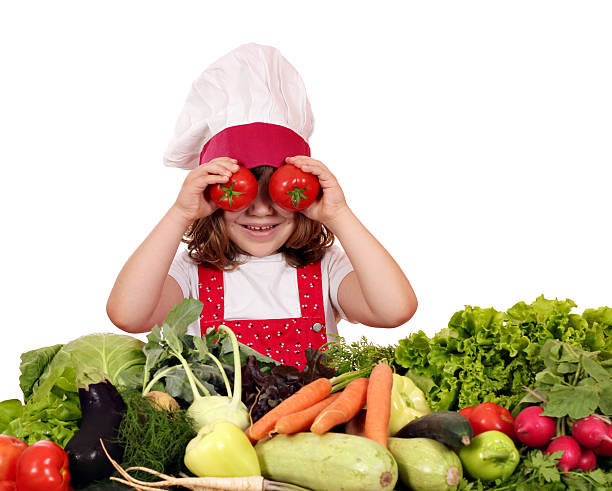 istock little girl cook with tomato eyes 179328003