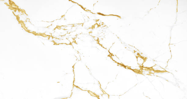 istock white gold marble stone tile for interior decoration. luxury background for banner, invitation, wallpaper, headers, website, print ads, packaging design template. statuario marble texture background. 1793298162