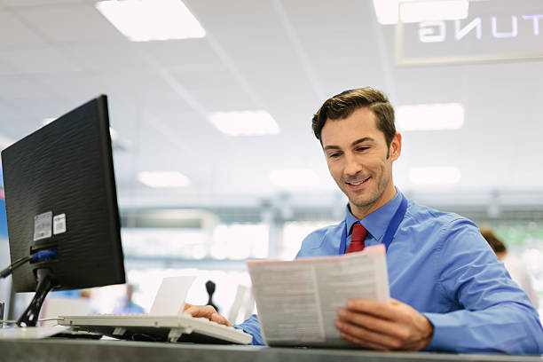 istock Retail store manager sitting at desk 179330641