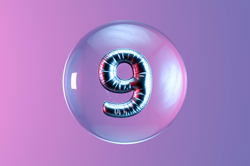 Number 9 balloon in glass sphere. Digitally generated image.