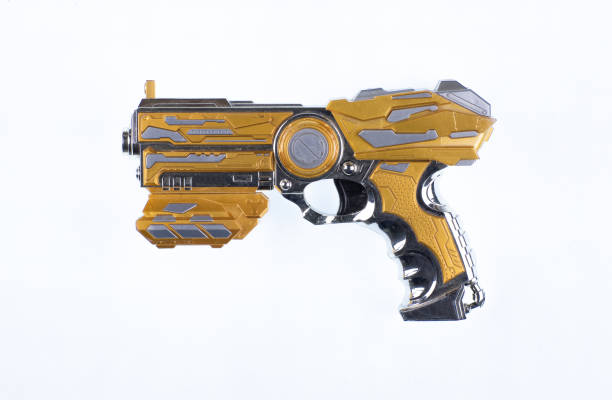 istock golden weapon blaster isolated on white background 1793328095