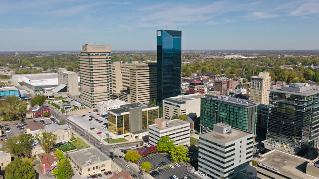 Backwards Aerial Shot of Downtown Lexington on Sunny Day