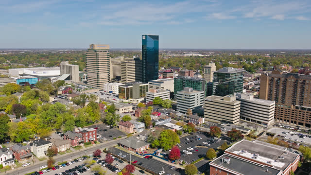 Backwards Drone Shot of Downtown Lexington on Sunny Day