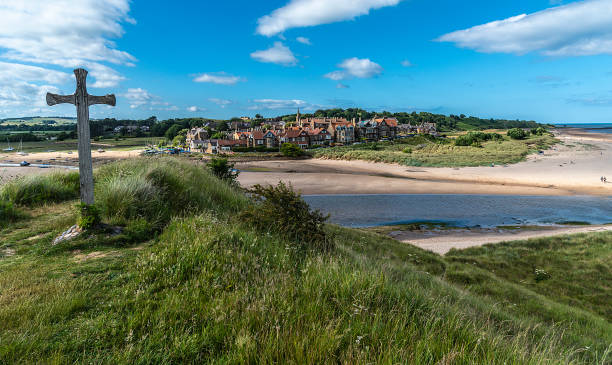 Located on the North Sea coast in Northumberland's National Landscape, England, it is a 7 miles long bay between Amble and Cresswell