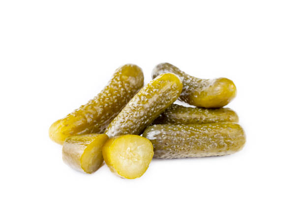 istock Delicious marinated pickled cucumbers, isolated on white background 1793349327