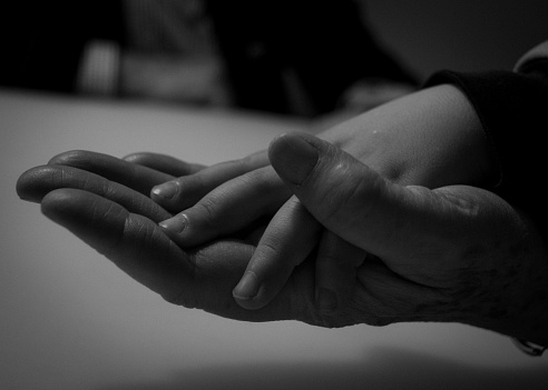 youth and old age. Hands of grandmother and granddaughter. High quality photo