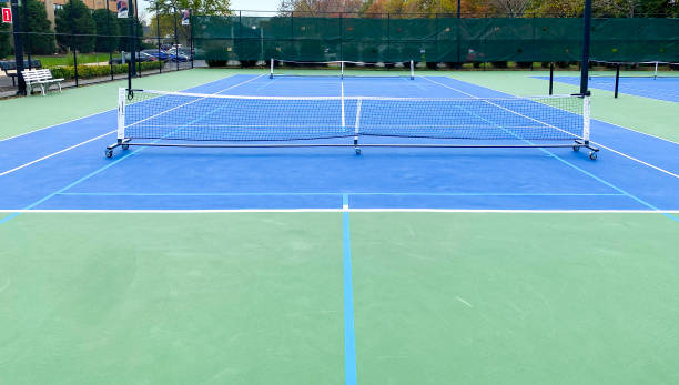 istock Portable pickleball nets placed on a tennis court 1793403733