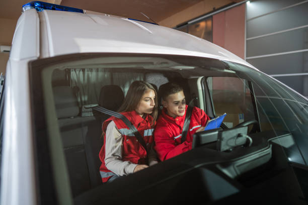 istock Paramedics managing paperwork in ambulance 1793404286