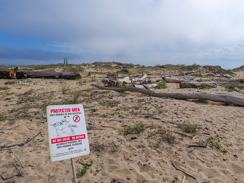 Wild life protected area sign on the beach