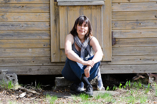 istock Woman sitting down 179341508