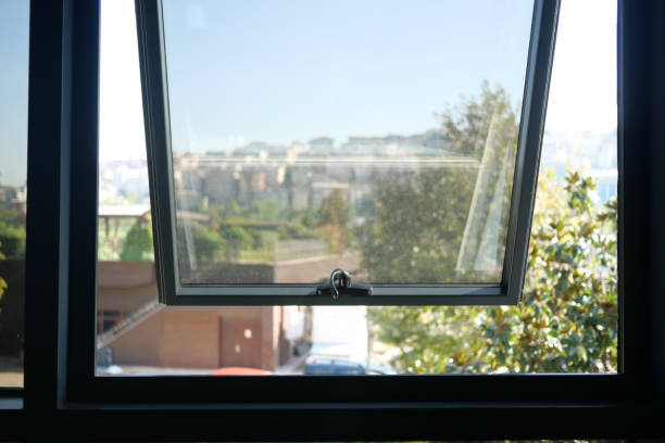 istock open black plastic pvc window at home. 1793422616