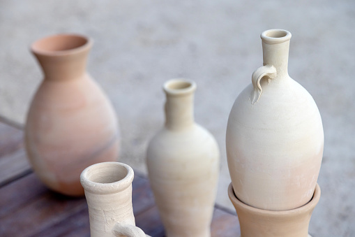 Clay jars and jugs at the traditional market in old Dubai, UAE