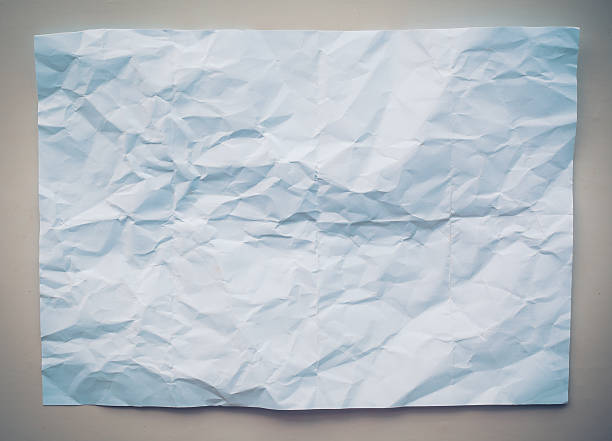 istock White crumpled paper on Gray background isolated 179345079