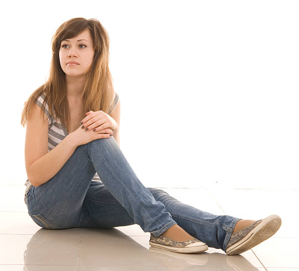 sad teenager over white