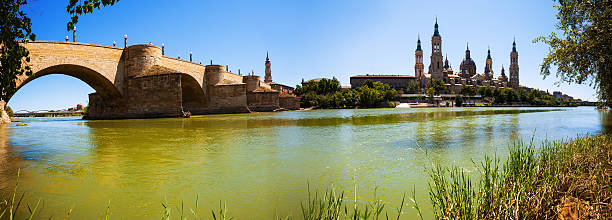 Panorama of Zaragoza Panorama of Zaragoza. Stone bridge and Cathedral. Aragon bridge of lions stock pictures, royalty-free photos & images