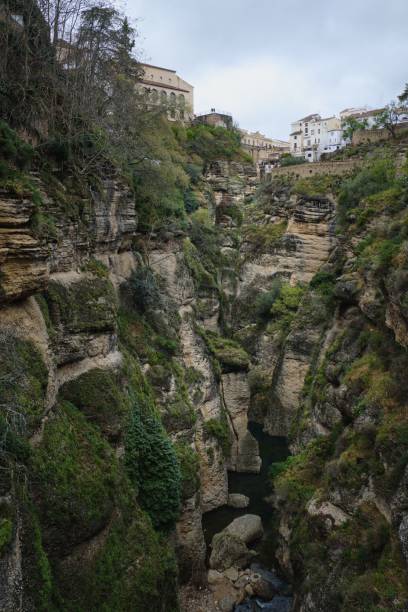 istock a river flowing through a canyon next to a cliff side 1793471089