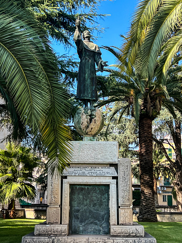 Pompeii, Italy, September 28, 2023: Statue of Saint. Maximilian Maria Kolbe next to the Basilica of Our Lady of the Rosary in Pompeii, Italy.