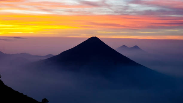 Sunrise from the summit of the Acatenango volcano View of the volcanoes from the summit of the Acatenango volcano guatemala landscape stock pictures, royalty-free photos & images