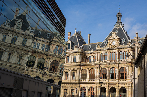 Reflection of the Palais de la Bourse in Lyon on the new Grand Bazar
