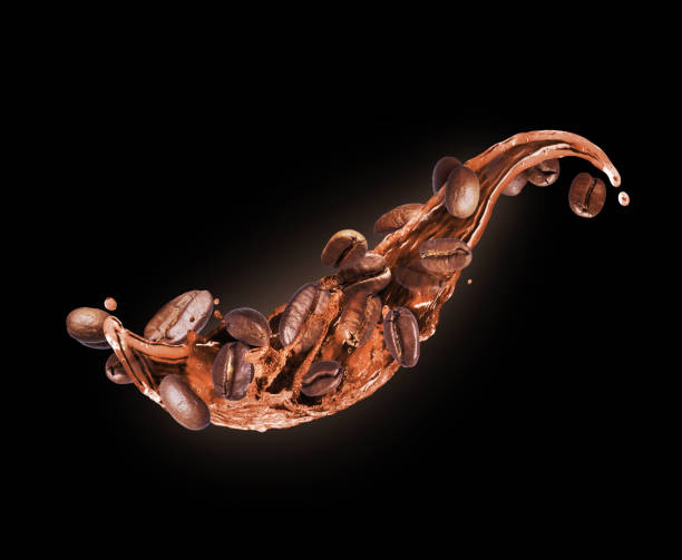 istock Roasted coffee beans in splashes close up on a black background 1793505272