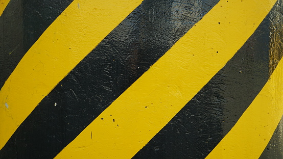 Black and yellow striped warning sign.