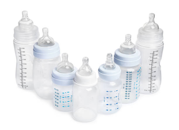 istock Many different empty feeding bottles for baby milk on white background 1793528606