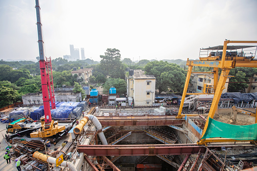Chennai, India - October 17, 2023. Large-scale infrastructure construction of the Chennai Metro Rail Line is viewed from above in the Anna Nagar residential area.