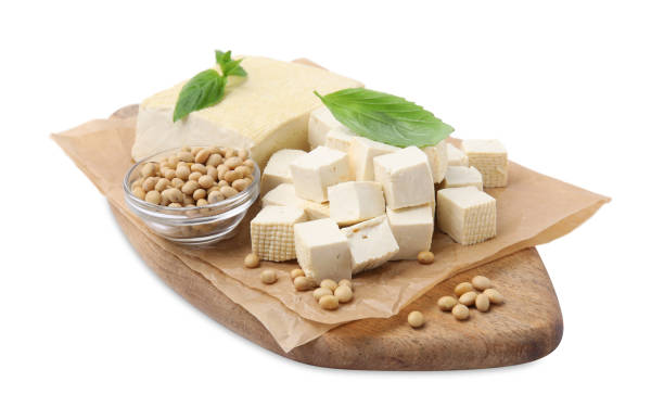 istock Delicious tofu cheese, basil and soybeans isolated on white 1793562464