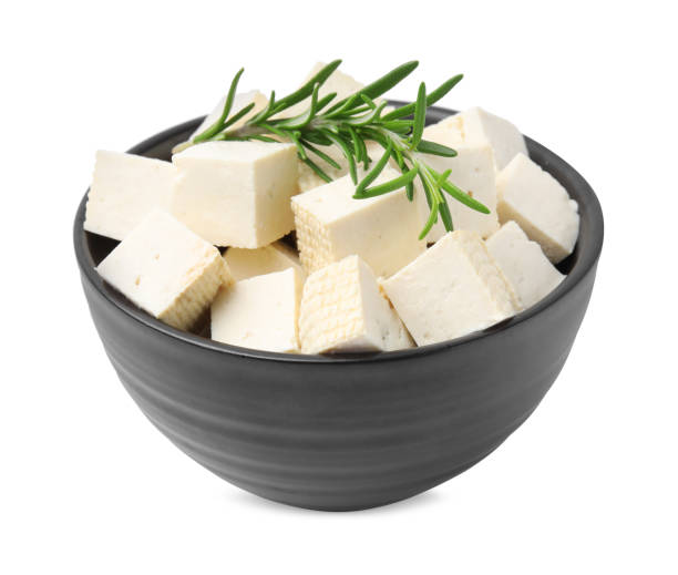 istock Delicious tofu cheese and rosemary isolated on white 1793562472