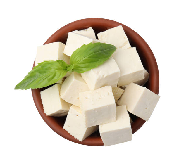 istock Delicious tofu cheese and basil on white background, top view 1793563022