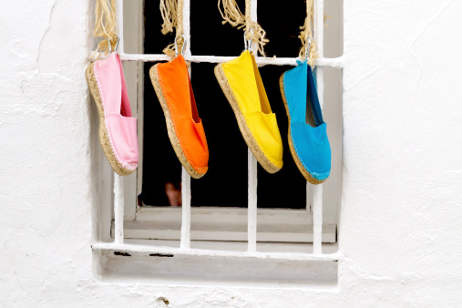 Four shoes hanging