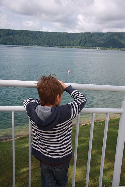 little mariner a 6 year old boy in front of the bodensee ausschau halten stock pictures, royalty-free photos & images