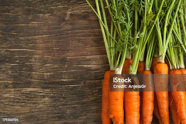 Fresh Carrots On Wooden Background Stock Photo - Download Image Now - Carrot, Close-up, Food